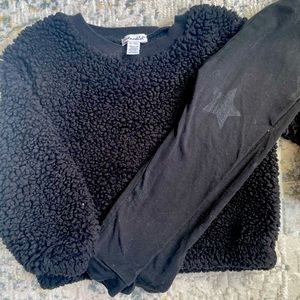Splendid two piece set black sweater with star leggings bowties on the side.